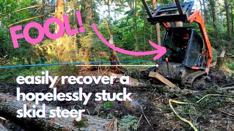 getting skid steer stuck out of work|skid steer unstuck recovery steps.